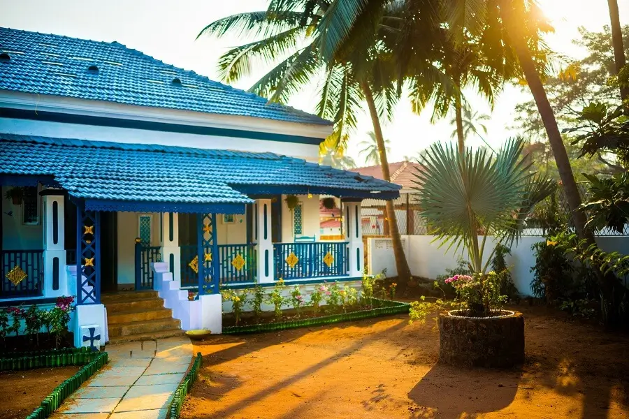 Exterior of a modern bungalow with peacock blue walls